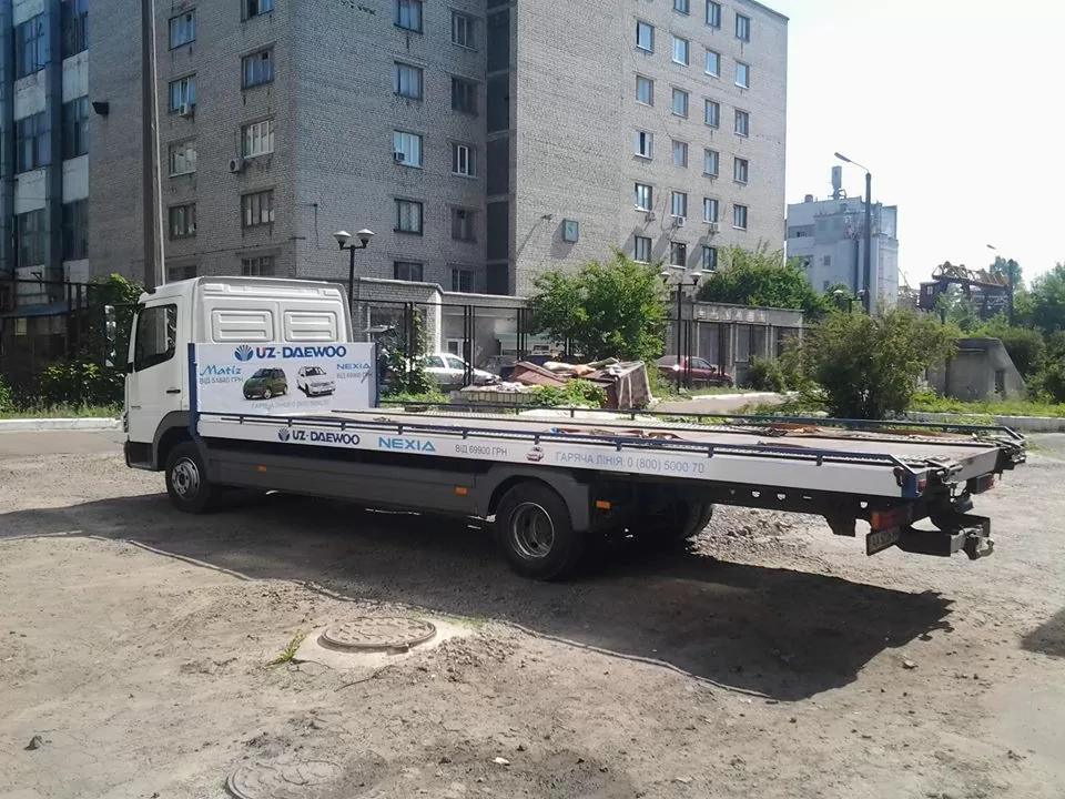 Обклеювання спецтранспорту рекламною плівкою брендування кузова